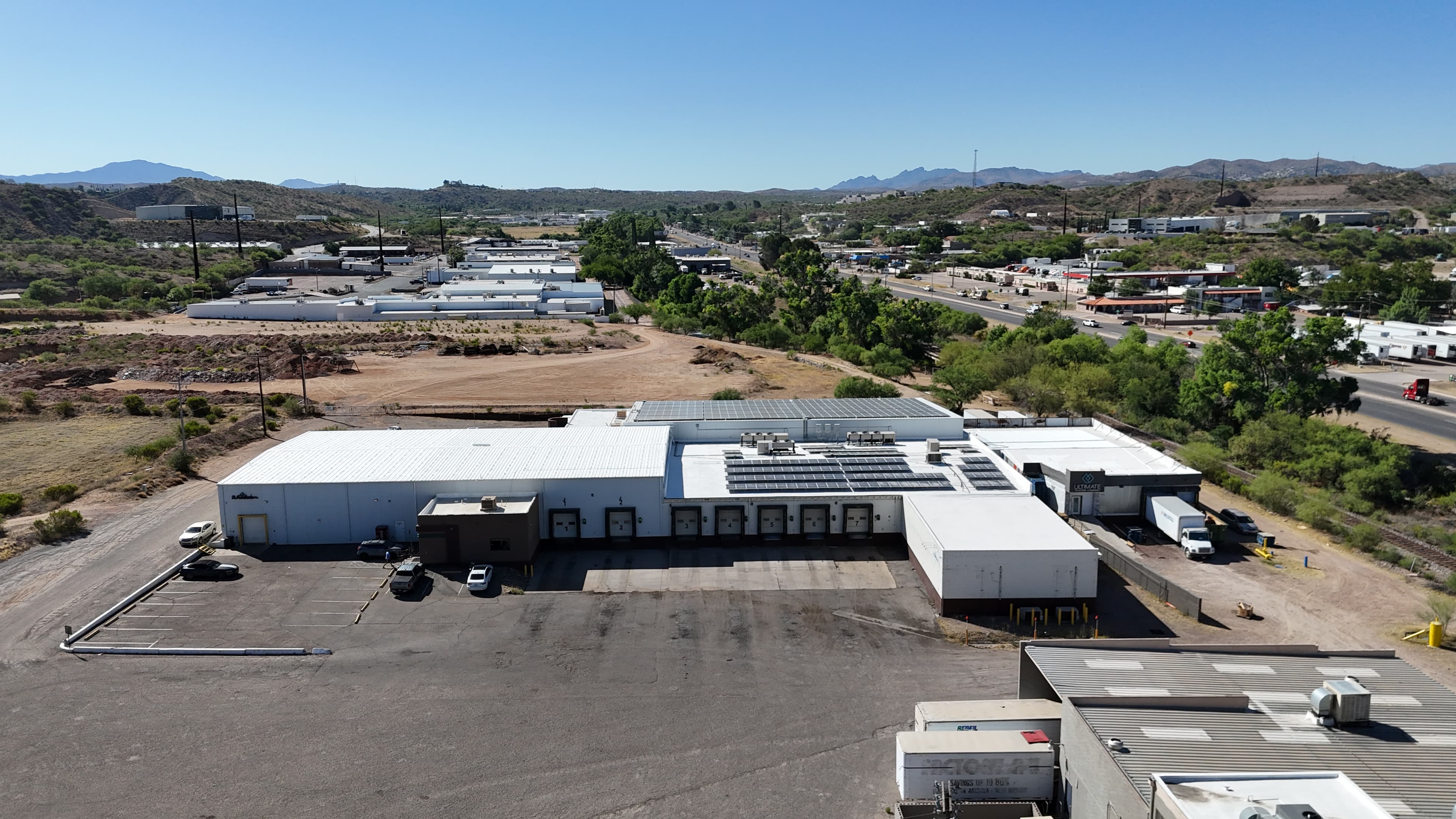 Aerial view of a Nogales cold-storage facility roof with solar